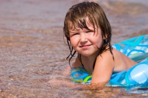 Little girl with air buoy